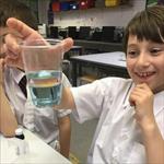 Boy with plastic glass