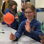 Girl admiring her kebab balloon