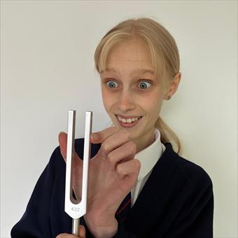 Touching a tuning fork