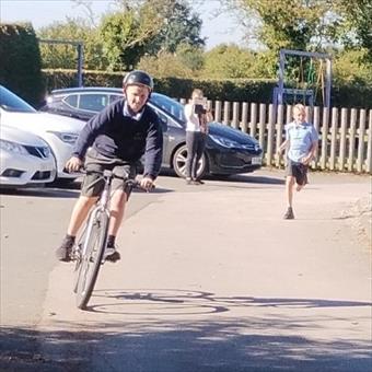 child running and cycling