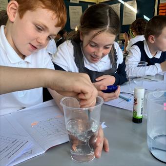 Children mixing liquids