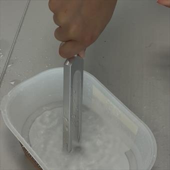 Tuning fork in water