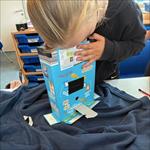 Girl looking in box