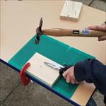 Child using a mat and clamp